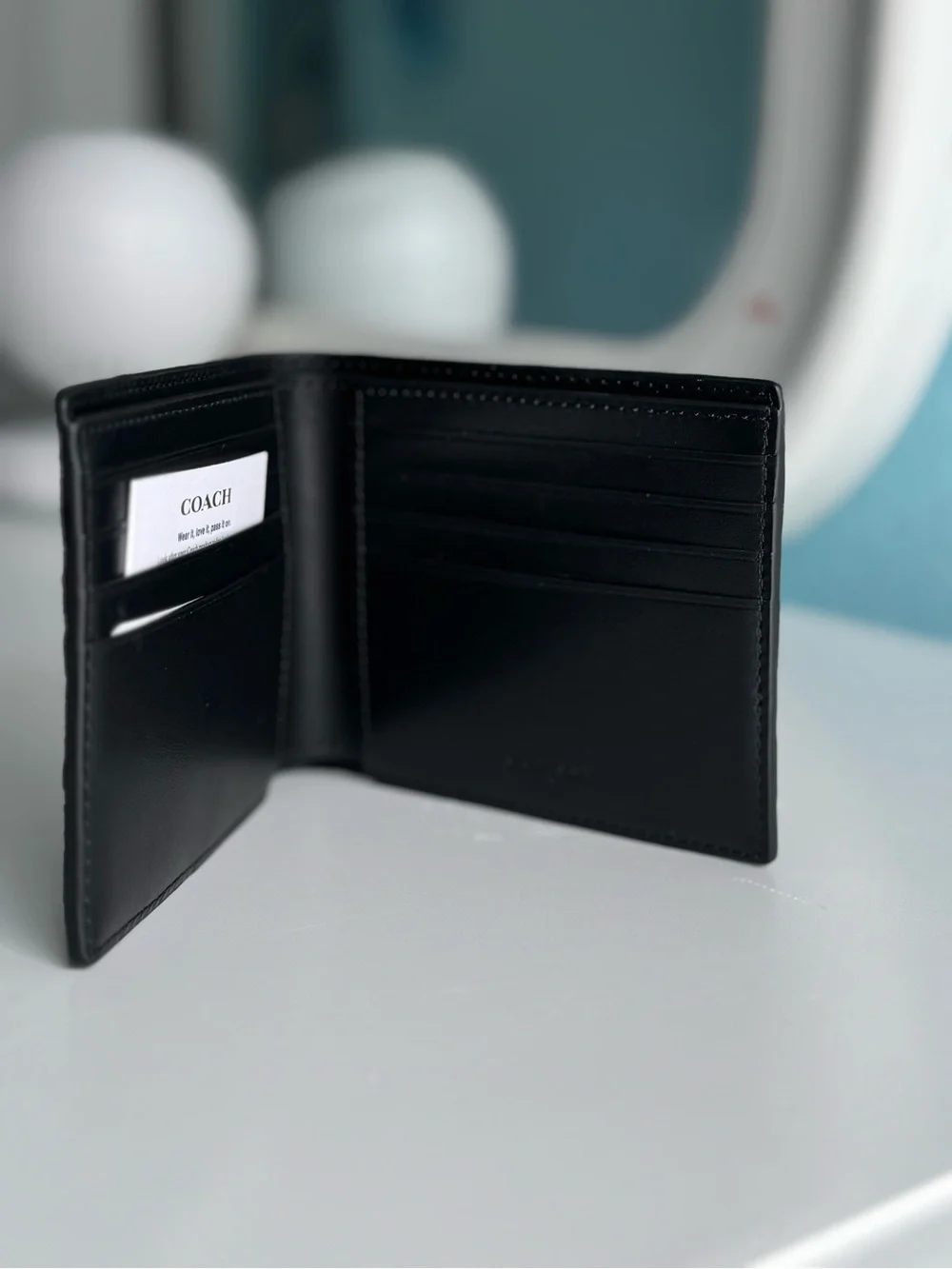 Coach Black Embossed Signature Leather Bifold Wallet